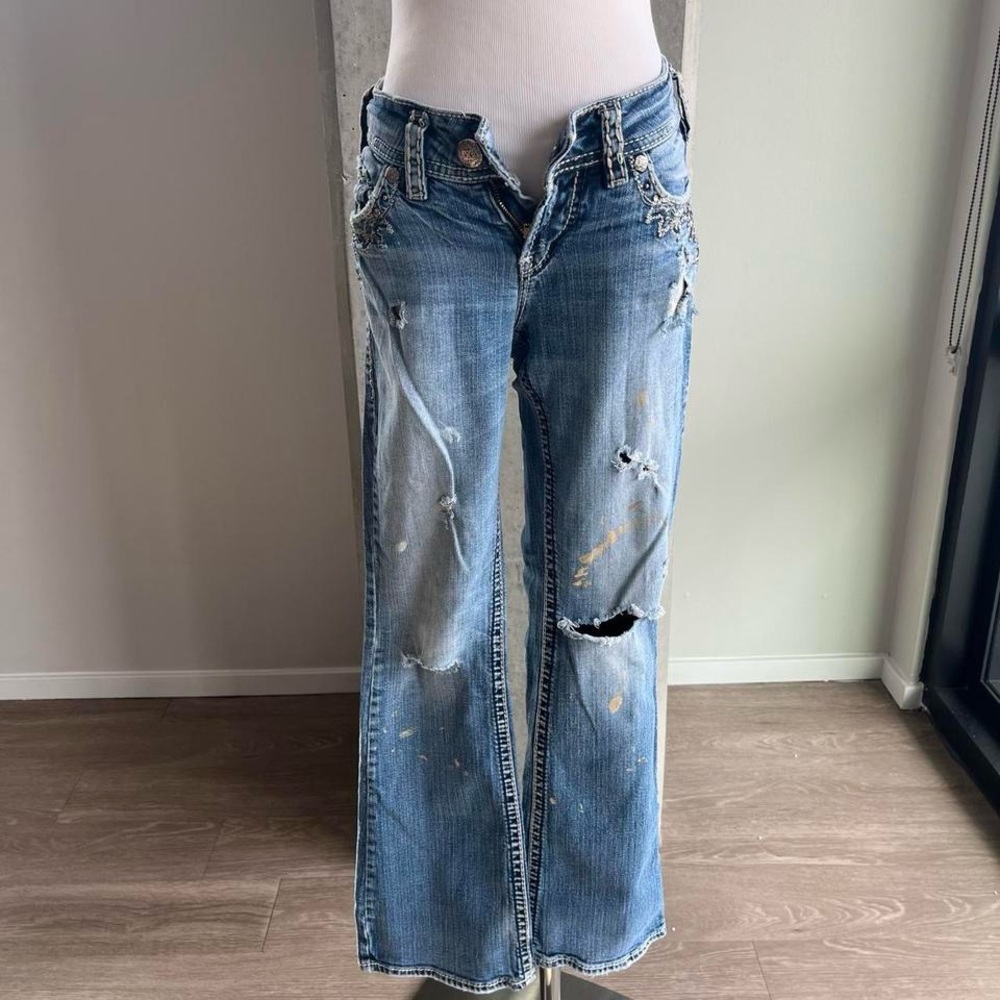 Distressed Blue Jeans